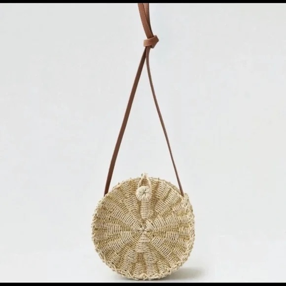 American Eagle Outfitters Handbags - NWOT American Eagle Outfitters Cream and Brown Crossbody Bag with Bohemian Charm
